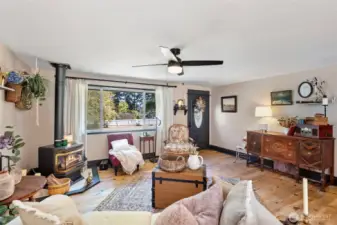 Barnwood floors throughout, 2 propane stoves, ceiling fans