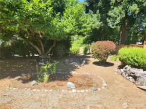Another view of the nicely landscaped front yard.