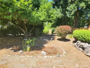 Another view of the nicely landscaped front yard.