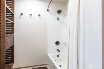 A pocket door allows privacy in this area.