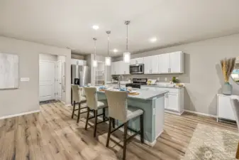 Phots are of the same floor plan in a different community. Finishes may vary.