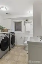 Lower Level 3/4 Bath + Laundry