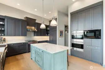 A true chef’s kitchen featuring premium high-end appliances, including a professional Wolf gas range, powered by natural gas, an exclusive advantage found only on this street on all of Camano Island.