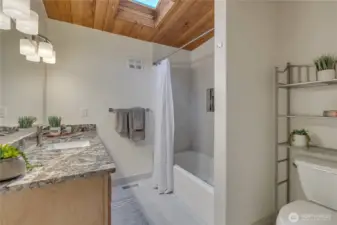 Full remodeled bath with custom tile and cabinetry