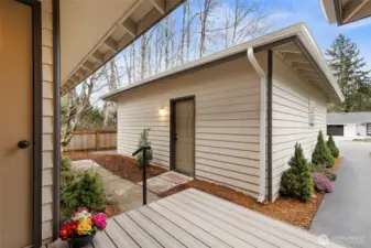 From the front porch, access the detached two-car garage.