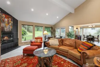 Inviting open concept living provides so many options for living and dining, and huge windows treat you to views of the golf course right out the back door.