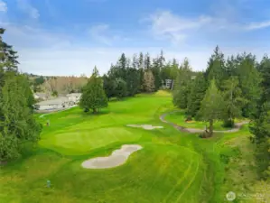 Right out your back door, the fairway and green of the 2nd hole beckons you to come out and play.