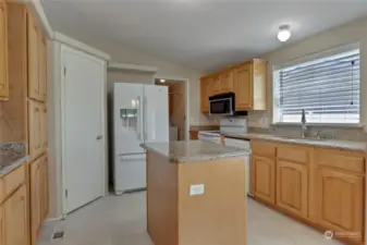 kitchen with island and walk in pantry