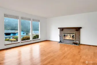 Living Room w/ Wood Burning Fireplace