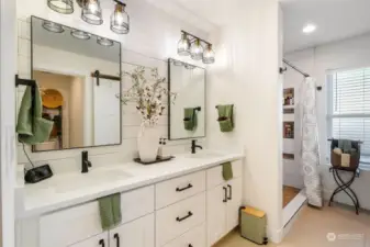 Primary bathroom with dual vanity sinks