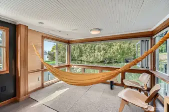 Yes, the hammock can stay—perfect for soaking in the best of lakefront living. Curl up with a good book, sip your favorite beverage, or simply relax and drift into an afternoon nap, all with the gentle sway of the water beneath you.