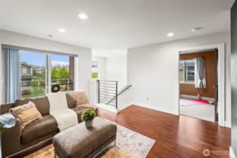 On the top of the stairs, spacious bonus room!