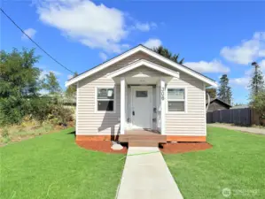 Charming single level home. Completely renovated from top to bottom, this home welcomes you with a fresh exterior, new siding, and a classic covered porch.