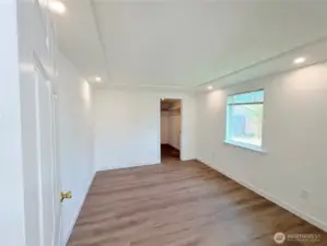 Primary Bedroom with a walk in closet