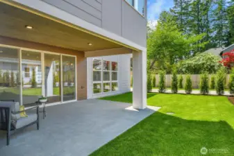 Host summer barbecues, set up a cornhole tournament, or just relax in your landscaped backyard.