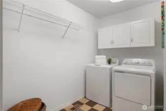 Large laundry room off garage entrance, plumbed for utility sink or dog washing station!?