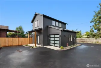 New, solid construction with metal roof and covered porch