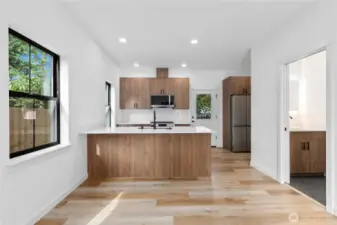 Walnut cabinets & island in kitchen
