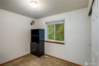3rd Bedroom is light and bright and backs to the greenbelt.