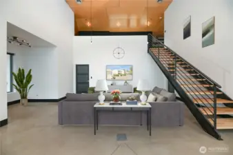 Living room with personal entry from left