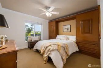 Bedroom 2 with built in Queen size Murphy Bed. When bed is up, there are 2 desktops to work from.