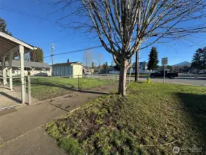 Fully fenced four-plex offering dedicated storage for each unit, along with an extra storage unit reserved for property management.