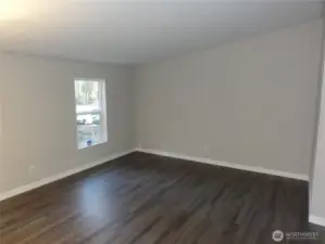 Great open area upon entering. Offers living room and dining area.