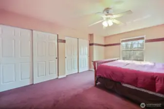 Two oversize wall closets with classic six-panel doors!