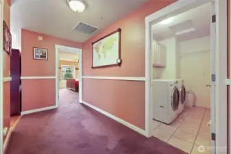 Large utility/laundry room adjacent to bedrooms and baths - perfect location as this is where majority of clothing & linens are generated!