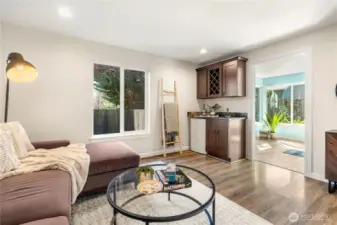 Entry level media room / flex room w/ wet bar