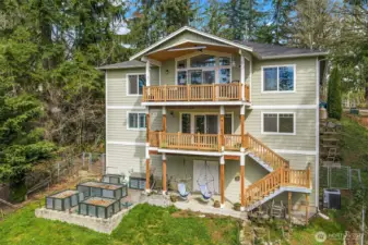 View of the back of the home. Get ready to enjoy 2 view decks and garden!