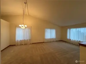 Formal livingroom and dining area. Awesome view of the Hood Canal and Olympic Mountains from front windows.