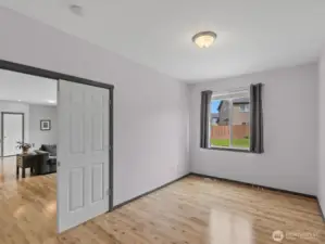 Other view of the main level bedroom w/out virtual staging.