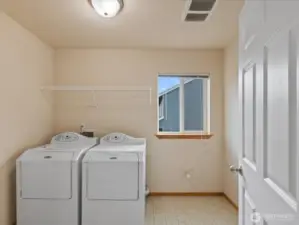 Laundry has room for a folding table or floor cabinet. Dryer vent recently cleaned.