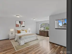 1 of 4 bedrooms on second level - all with walk-in closets! Updated laminate flooring.