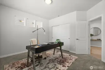 Located off the entry, this 4th bedroom offers the flexibility of main level living or a remote office if desired.