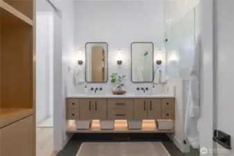 A clean fresh look in the primary bathroom.