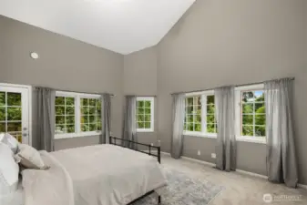 Main floor guest suite with private deck.
