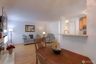 Open concept dining room, living room and kitchen.