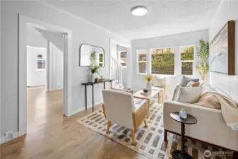 Living room leads to the kitchen and dining area