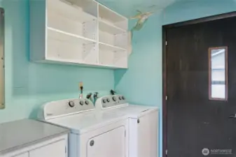Laundry room off dining room - back door entrance