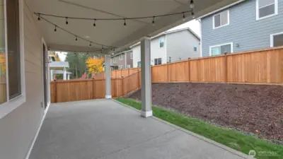 Enjoy outdoor living rain or shine with this cozy, covered patio.