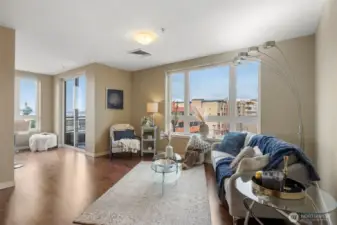 Beautiful modern living space with hardwoods and views of the Sound, Space needle, Key arena and more.