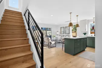 Let's head upstairs. Entrance from garage to your left