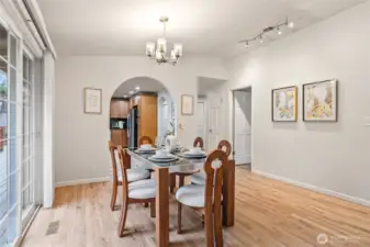 Dining room with vaulted ceiling.