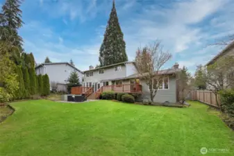 Flat, fully fenced private backyard.