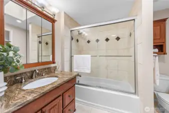 Primary bath has skylight (now shown on photo).