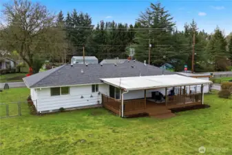 The brand new roof and wonderful, covered back deck are just a couple of its many features.
