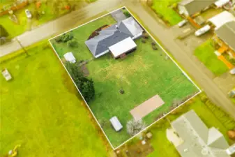 Property boundaries are approximate; buyer to verify. Notice the corner lot location with access from the side street.