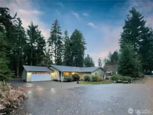 RV Parking and electric hookup next to the garage. This huge driveway has room for a party.